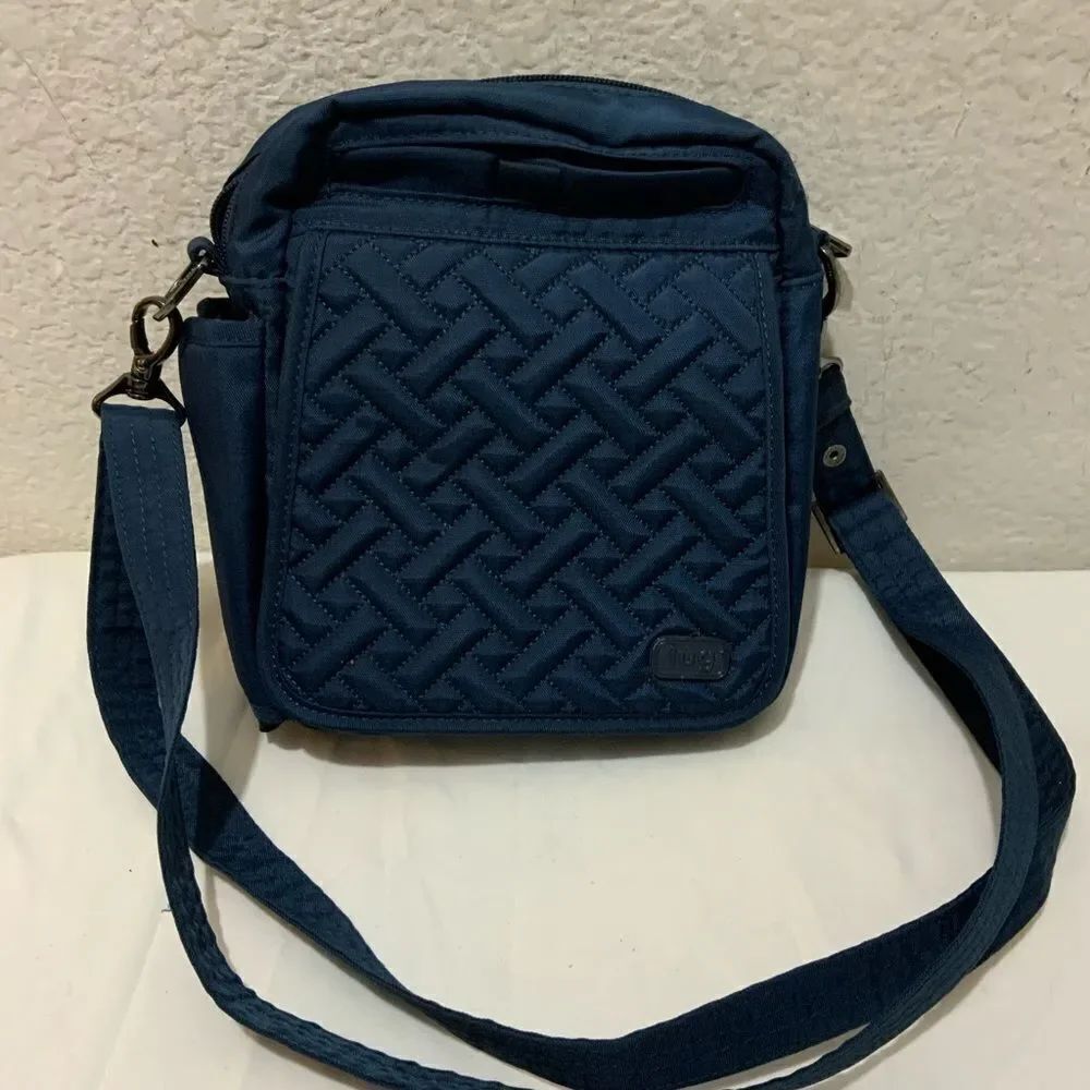 Lug Flapper blue quilted nylon travel crossbody belt bag convertible